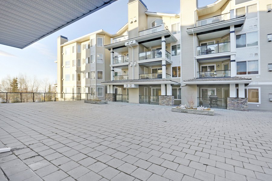 Main Photo: 121 345 Rocky Vista Park NW in Pavilions: Lowrise Apartment for sale : MLS®# C3651078