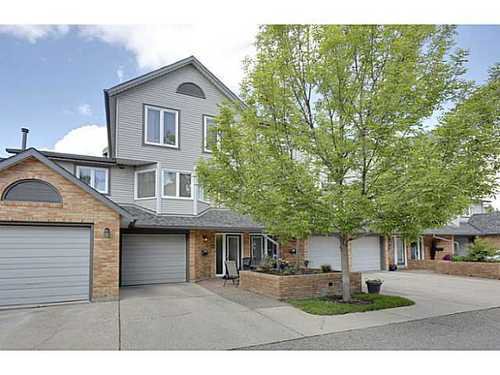 Main Photo: 22 COACHWAY Green SW in Calgary: 4 Level Split for sale : MLS®# C3572923
