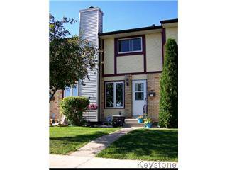 Main Photo: 449 Augier Avenue in Winnipeg: Westwood / Crestview Townhouse for sale (West Winnipeg) : MLS®# 1211866