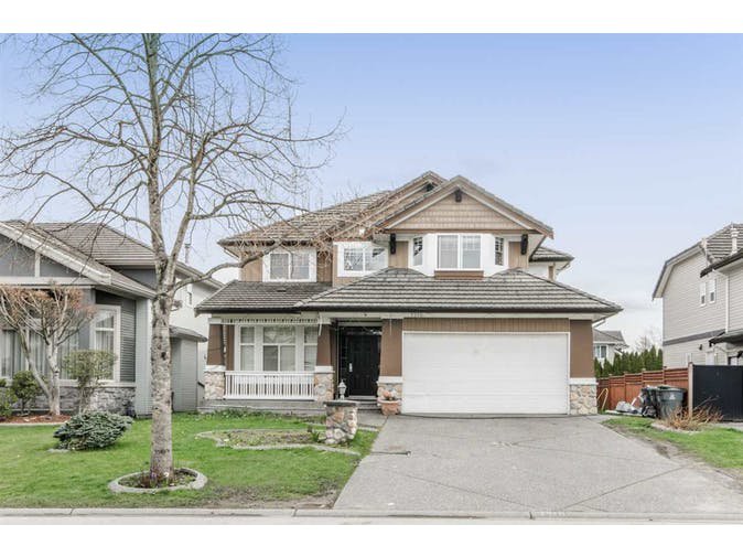 Main Photo: 7310 146 Street in Surrey: East Newton House for sale : MLS®# 2255713
