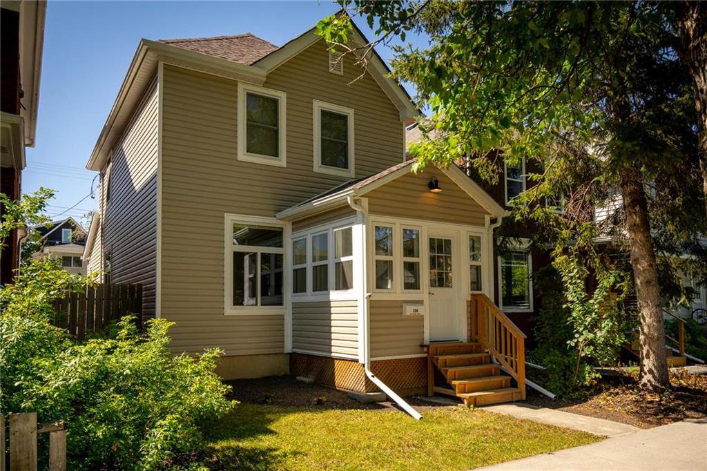 Beautifully upgraded- siding, shingles, front step all add to the charming curb appeal.
