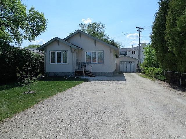 IMMACULATE 823 sq.ft Bungalow with front drive 2 BR, 1 Bath, Finished Recroom, Commercial Zoning