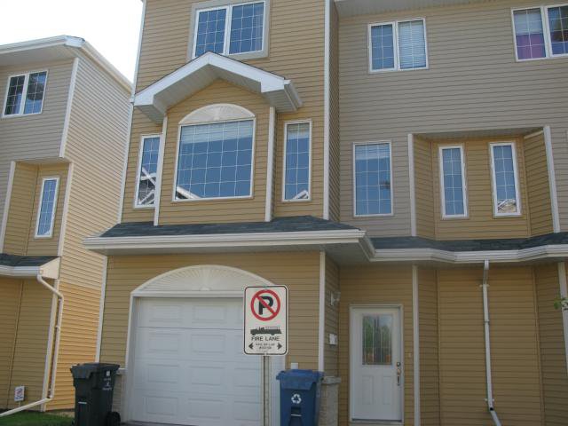 Main Photo: 41 Morello Bay in WINNIPEG: Maples / Tyndall Park Townhouse for sale (North West Winnipeg) : MLS®# 1315240