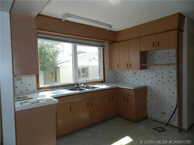 Main Photo: in Lacombe: LE Downtown Lacombe Property for sale : MLS®# CA0001395
