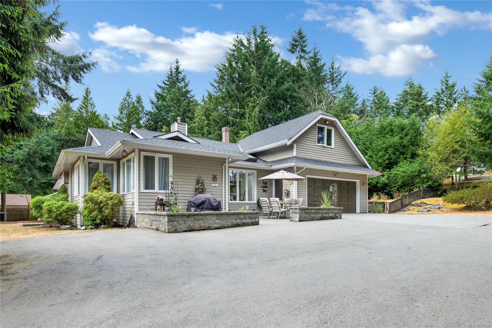 Main Photo: 7108 Aulds Rd in : Na Upper Lantzville House for sale (Nanaimo) : MLS®# 851345