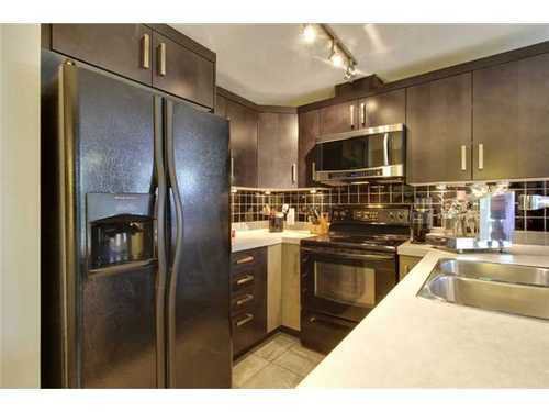 Main Photo: 310 1 Street SE in Calgary: Single Level Apartment for sale : MLS®# C3548056